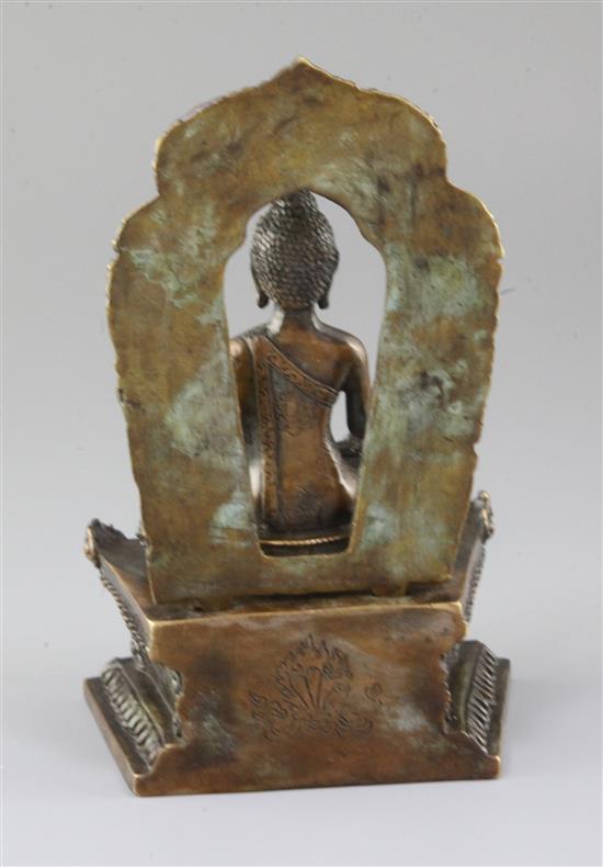 A Himalayan bronze seated figure of Buddha Shakyamuni, Qing dynasty, total height 18.5cm